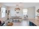 Charming dining area with a farmhouse style table and bench at 2949 Muller Oak Loop, Ocoee, FL 34761