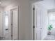 Bright hallway with doors to bedrooms and other rooms at 2949 Muller Oak Loop, Ocoee, FL 34761