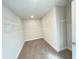 Large walk-in closet with wire shelving and neutral carpeting at 3019 Tackle Drive, Leesburg, FL 34748