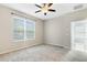 Bright bedroom with neutral walls and carpet flooring at 308 Vestrella Dr, Kissimmee, FL 34759