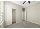 Bedroom with neutral walls, carpet flooring and closet at 308 Vestrella Dr, Kissimmee, FL 34759