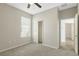 Bedroom with neutral walls, carpet flooring and closet at 308 Vestrella Dr, Kissimmee, FL 34759