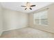 Spacious bedroom with neutral walls and carpet flooring at 308 Vestrella Dr, Kissimmee, FL 34759