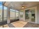 Screened porch with sliding glass doors and view to backyard at 308 Vestrella Dr, Kissimmee, FL 34759