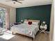 Main bedroom with king-size bed and access to backyard at 3663 Lomond Ct, Apopka, FL 32712