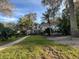 Exterior of home showcasing stone accents and lush landscaping at 3663 Lomond Ct, Apopka, FL 32712