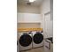 Bright laundry room with Whirlpool appliances and wood countertop at 3663 Lomond Ct, Apopka, FL 32712