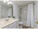 Clean bathroom with a shower/tub combo and white vanity at 3756 Idlebrook Cir # 206, Casselberry, FL 32707