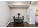 Simple dining room with dark wood floors and a small table at 3756 Idlebrook Cir # 206, Casselberry, FL 32707