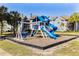 playground with swings and a slide at 3756 Idlebrook Cir # 206, Casselberry, FL 32707