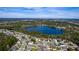 Wide aerial view of community and lake at 405 Kehoe Blvd, Orlando, FL 32825