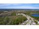 Wide aerial view of community and lake at 405 Kehoe Blvd, Orlando, FL 32825