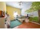 Bedroom with tree mural, full-size bed, and terracotta tile floors at 405 Kehoe Blvd, Orlando, FL 32825