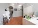 Home office features built-in shelving and terracotta tile floors at 405 Kehoe Blvd, Orlando, FL 32825