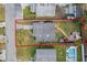 Aerial view showcasing house, yard, and pool at 4304 Mizell St, Orlando, FL 32812