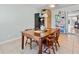 Small dining area with wood table and chairs, located near the kitchen at 4304 Mizell St, Orlando, FL 32812