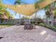 Relaxing patio with shaded seating area, perfect for outdoor dining at 4304 Mizell St, Orlando, FL 32812