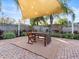 Relaxing patio area with shaded seating and plants at 4304 Mizell St, Orlando, FL 32812