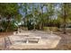 Brick paved sitting area with benches, ideal for relaxing outdoors at 452 Misty Oaks Run, Casselberry, FL 32707