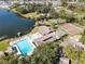 Community features pool, tennis courts, and lake at 513 Goodridge Ln, Fern Park, FL 32730