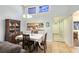 Dining area with table and chairs, kitchen pass-through at 513 Goodridge Ln, Fern Park, FL 32730