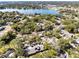 Aerial view of townhome community near lake at 513 Goodridge Ln, Fern Park, FL 32730