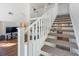 Bright and spacious staircase leading to upper level at 5159 Wellington Park Cir # 36, Orlando, FL 32839