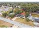 Aerial view of a single-story house with a yard and driveway at 5216 Bonnie Brae Cir, Orlando, FL 32808