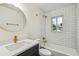 Updated bathroom with white subway tile and gold fixtures at 5216 Bonnie Brae Cir, Orlando, FL 32808