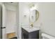 Stylish bathroom with a modern vanity and gold accents at 5216 Bonnie Brae Cir, Orlando, FL 32808