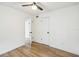 Bright bedroom with light wood floors and neutral walls at 5216 Bonnie Brae Cir, Orlando, FL 32808