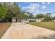 House exterior with a carport and neat landscaping at 5216 Bonnie Brae Cir, Orlando, FL 32808