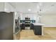 Modern kitchen featuring stainless steel appliances and light-colored cabinetry at 5216 Bonnie Brae Cir, Orlando, FL 32808