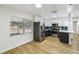 Modern kitchen with stainless steel appliances and light cabinets at 5216 Bonnie Brae Cir, Orlando, FL 32808