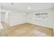 Bright and airy living room with light wood-look flooring at 5216 Bonnie Brae Cir, Orlando, FL 32808