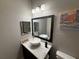 Modern bathroom with updated vanity and vessel sink at 5550 E Michigan St # 2223, Orlando, FL 32822