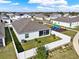 Aerial view of a fenced backyard and play area in a Gathering-friendly neighborhood at 558 Pawnee Ct, Haines City, FL 33844