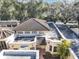 Aerial view showcasing the unique roofline of home at 706 Santa Cruz Ln # 706, Howey In The Hills, FL 34737