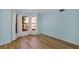 Bright bedroom featuring a bay window and light blue walls at 706 Santa Cruz Ln, Howey In The Hills, FL 34737