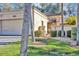 Exterior view of home with garage and landscaping at 706 Santa Cruz Ln # 706, Howey In The Hills, FL 34737