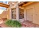 Front entrance with bay window and terracotta tile walkway at 706 Santa Cruz Ln, Howey In The Hills, FL 34737