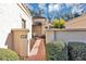 Front entry with walkway and lush landscaping at 706 Santa Cruz Ln # 706, Howey In The Hills, FL 34737