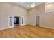 Spacious living room featuring a high ceiling and French doors leading outdoors at 706 Santa Cruz Ln, Howey In The Hills, FL 34737