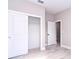 This bedroom features a large closet with sliding doors at 7542 Sw 128 Terrace Rd, Dunnellon, FL 34432