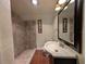 Clean bathroom with tiled shower and vanity at 800 Lake Marion Dr, Altamonte Springs, FL 32701