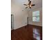 Bright and airy bedroom with hardwood floors and ceiling fan at 800 Lake Marion Dr, Altamonte Springs, FL 32701