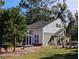 Mid-century modern home with screened porch and brick patio at 800 Lake Marion Dr, Altamonte Springs, FL 32701