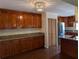 Kitchen with granite countertops and wooden cabinets at 800 Lake Marion Dr, Altamonte Springs, FL 32701