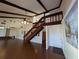 Living room with hardwood floors, high ceilings, and a loft area at 800 Lake Marion Dr, Altamonte Springs, FL 32701