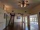 Open living room featuring hardwood floors and access to a sunroom at 800 Lake Marion Dr, Altamonte Springs, FL 32701